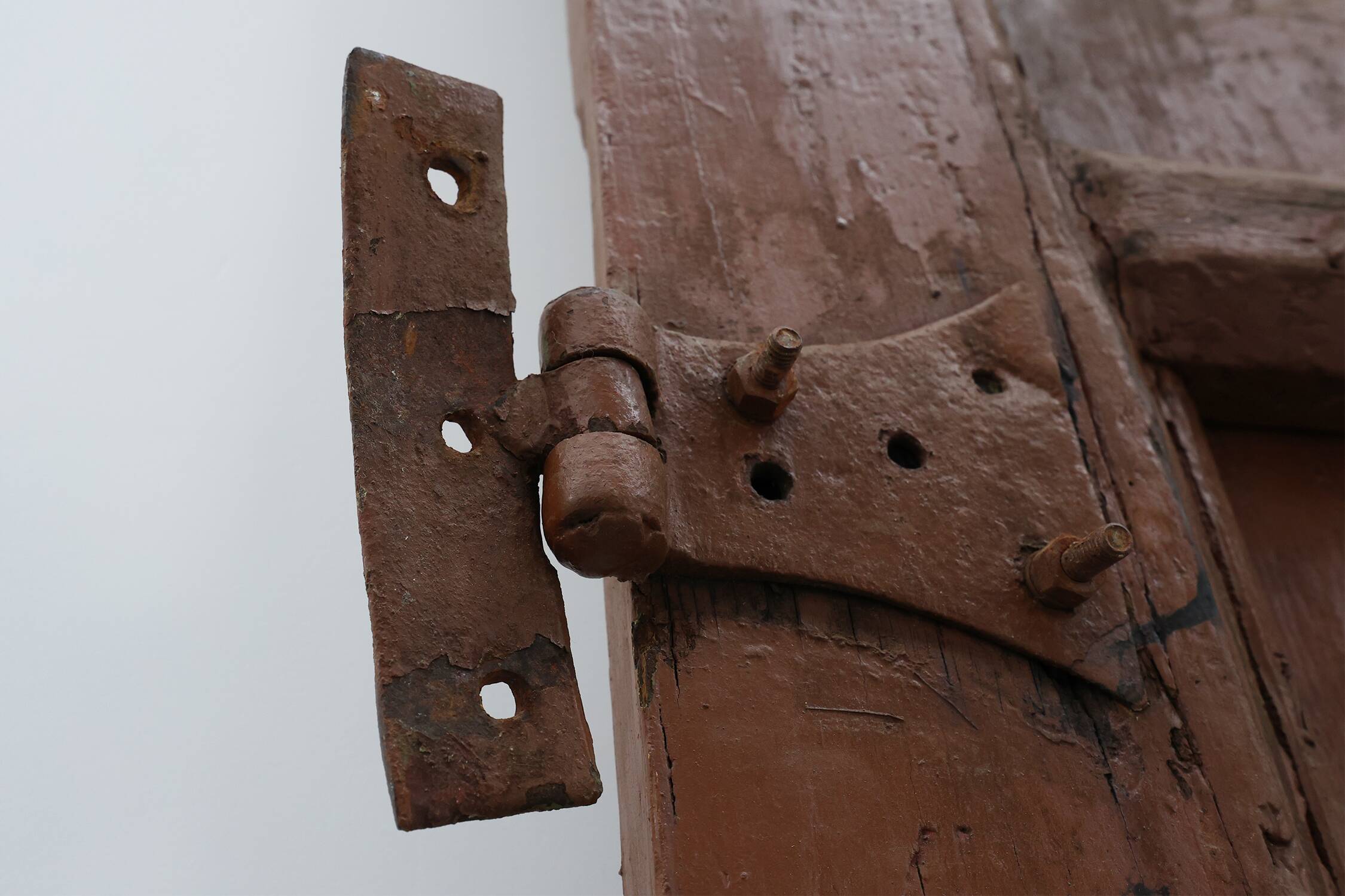 Large 17th century Monastery doors in terracotta lacquered oak, Portugal