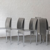 Set of 6 dining chairs in bent aluminum, 1980’s