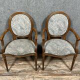 Pair of Louis XVI armchairs with medallion backs circa 1940