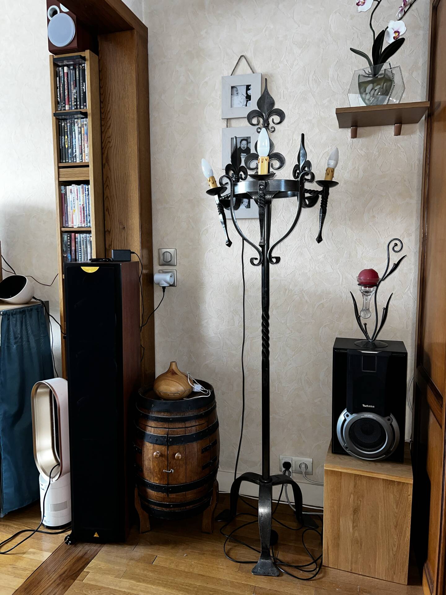 Medieval-style floor lamp, made of wrought iron.