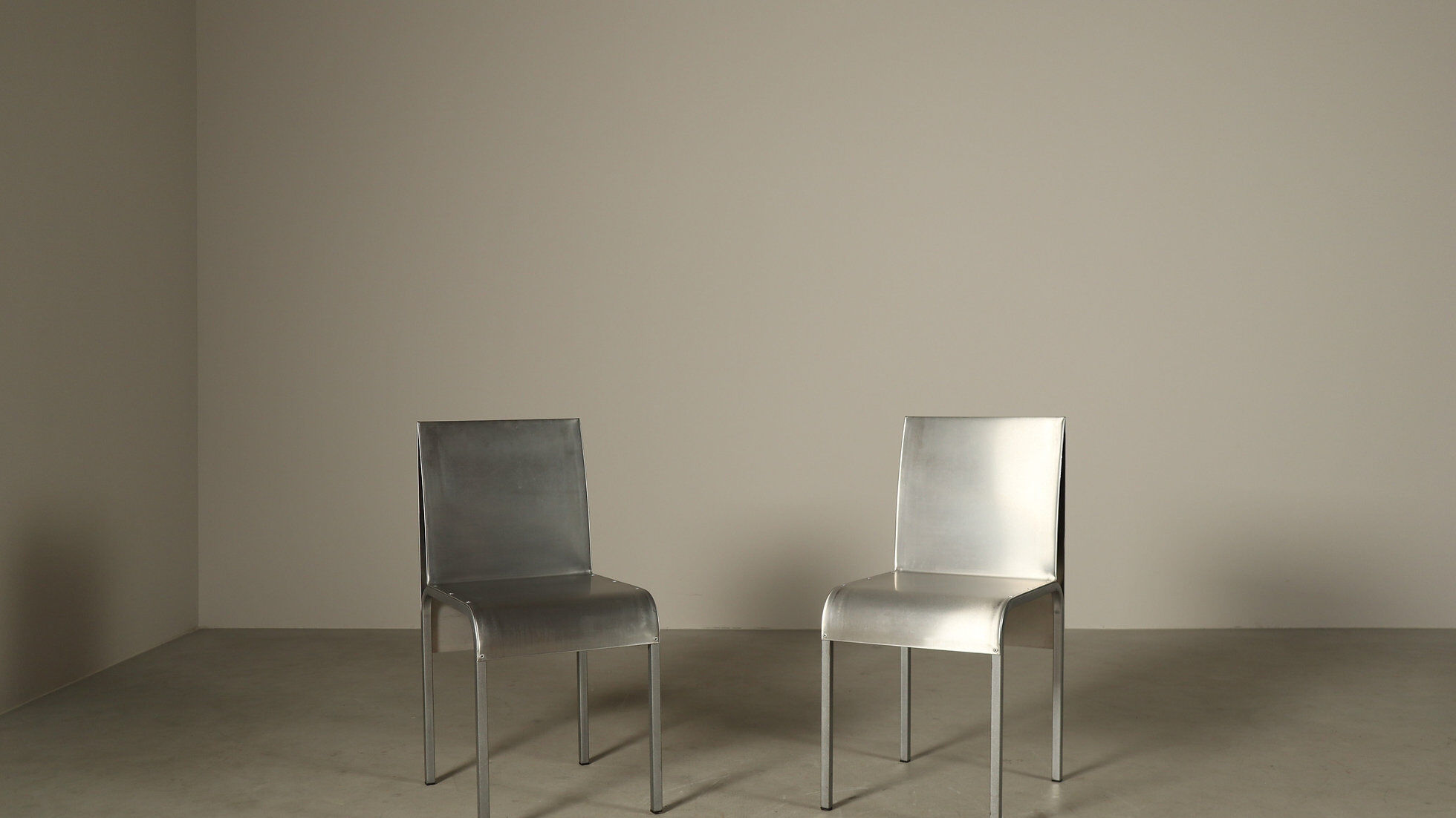 Set of six postmodernist stainless steel dining chairs from circa 1980-1990.