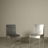 Set of six postmodernist stainless steel dining chairs from circa 1980-1990.