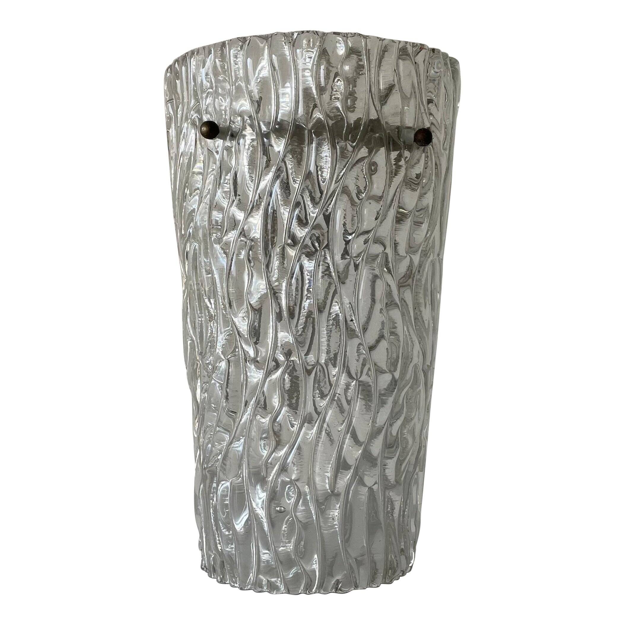 Simple arch-shaped wall light in textured glass, 1950s, Germany.