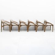 Ensemble de six chaises de salle à manger contemporaines italiennes avec cadre courbé sculptural.