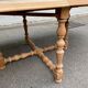 Round extendable farmhouse dining table, stripped, Louis XIII style from the 1960s.