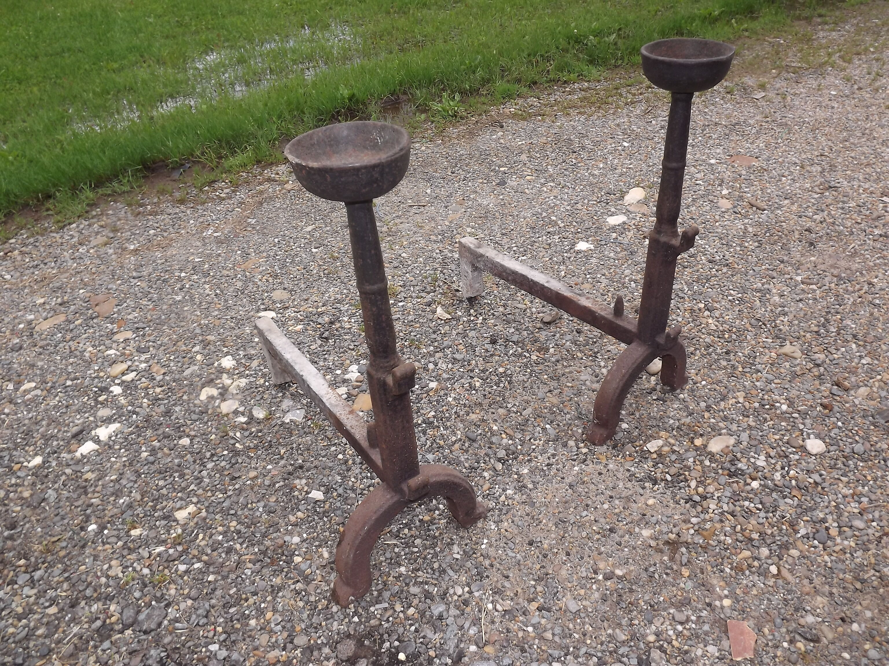 Shield fire with cast iron andirons