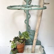 Enameled cast iron umbrella stand from the early 20th century