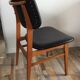 Scandinavian chair of the 60s in teak and black skaï