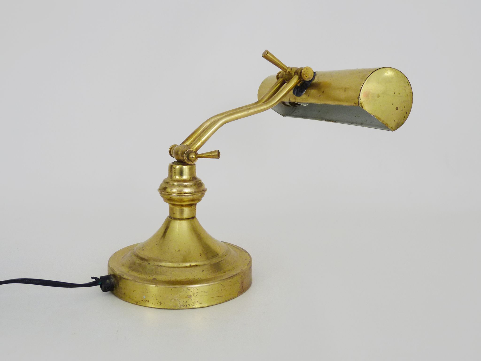 Old articulated piano lamp