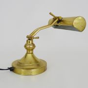 Old articulated piano lamp