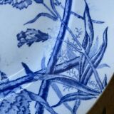 Plate decorated with blue birds and butterflies