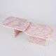 Pair of nesting coffee tables in pink marble, France, 1970s