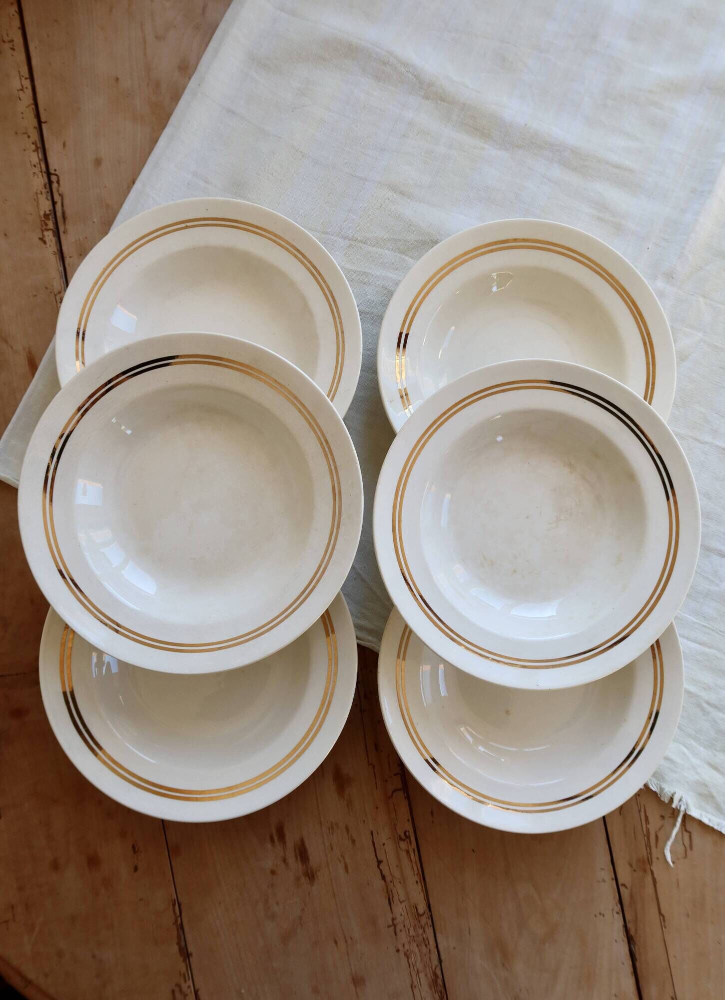 6 vintage ivory earthenware deep plates with double gold trim