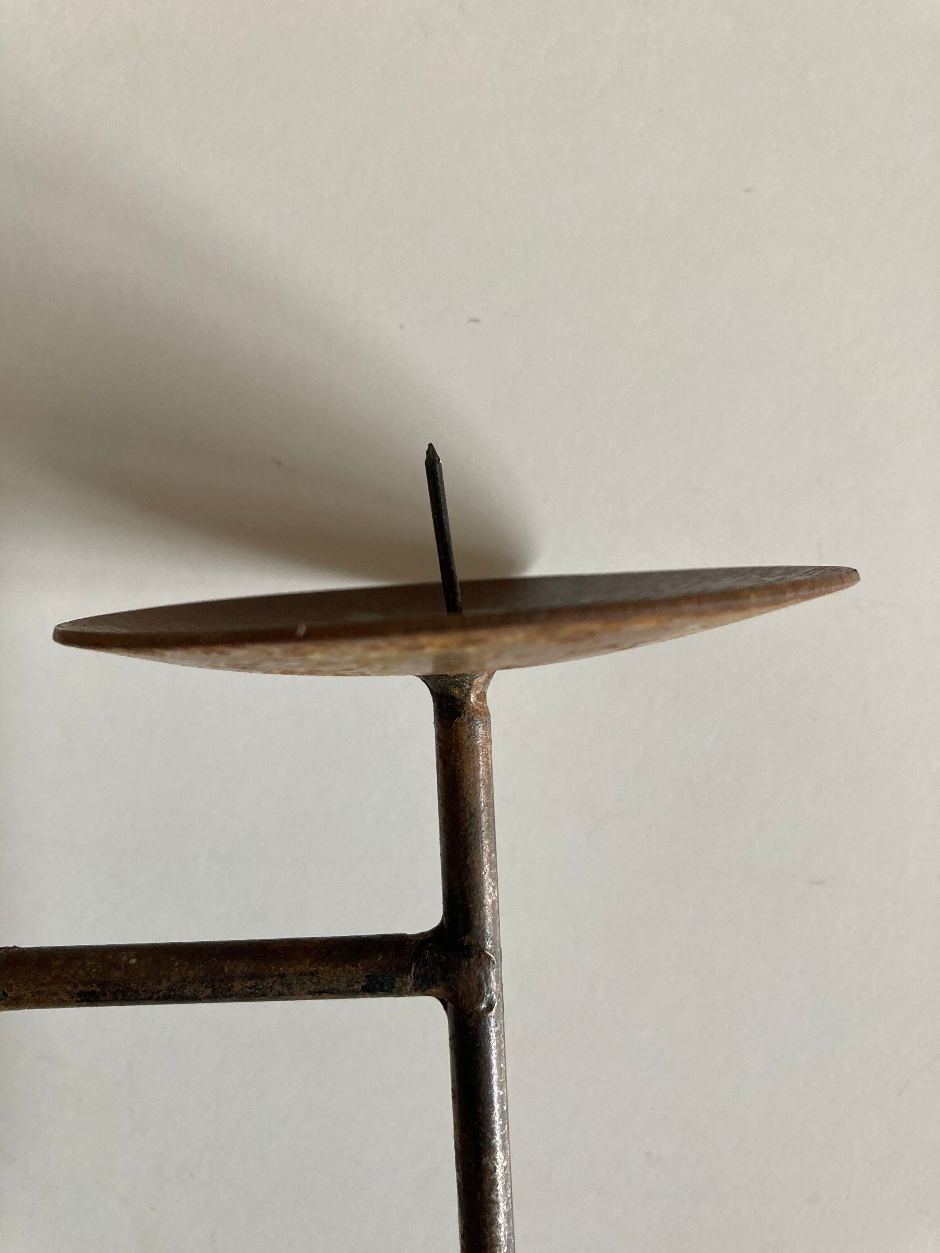 Raw beaten iron candlestick 1970