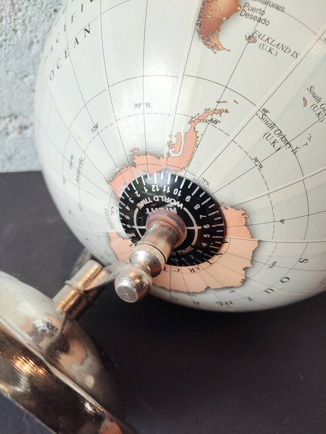Decorative terrestrial globe on silver metal stand – explorer style