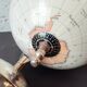 Decorative terrestrial globe on silver metal stand – explorer style