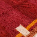 Minimalist burgundy cherry red shaggy berber rug