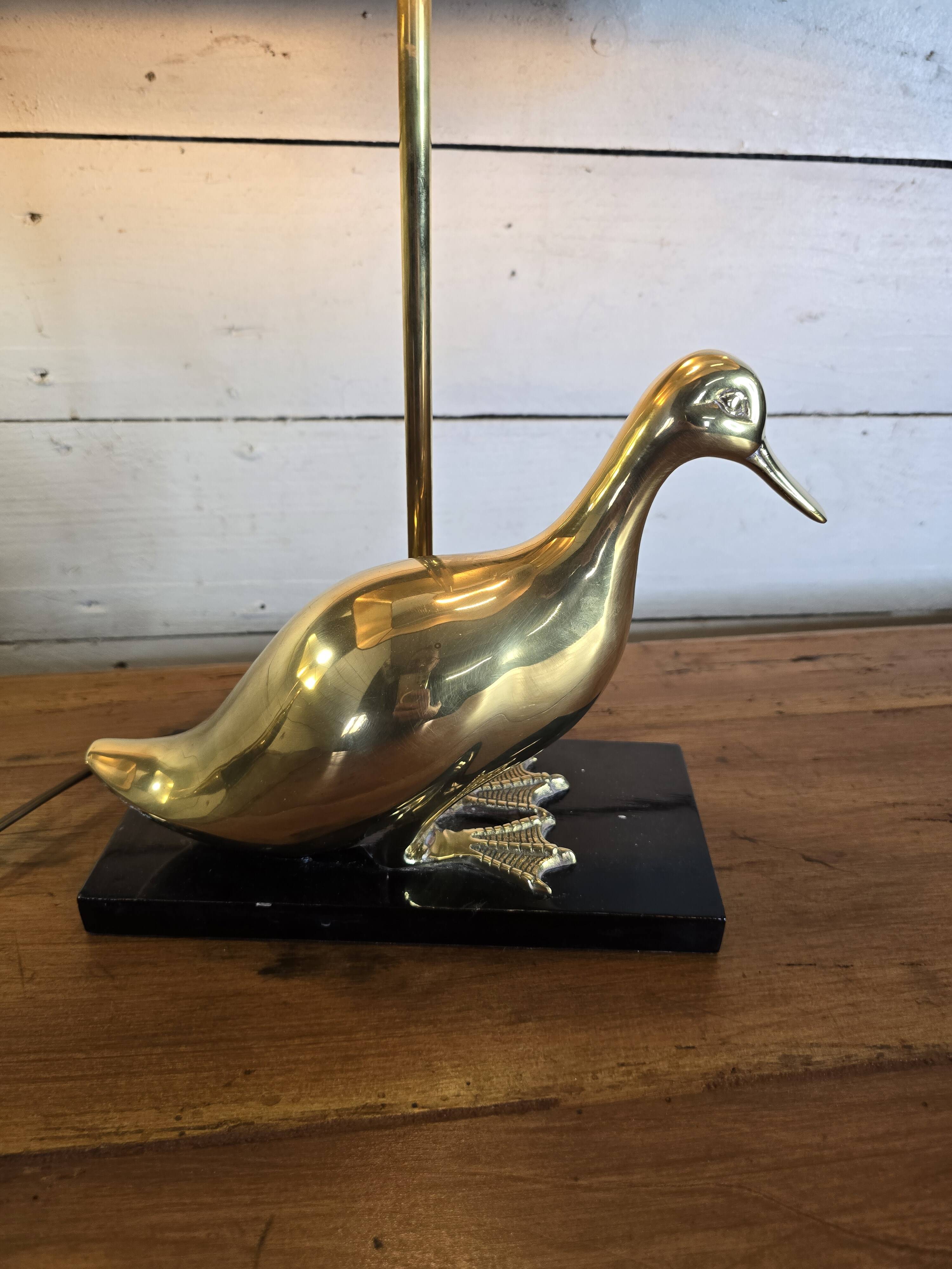 Pair of 70s table lamps featuring a brass duck