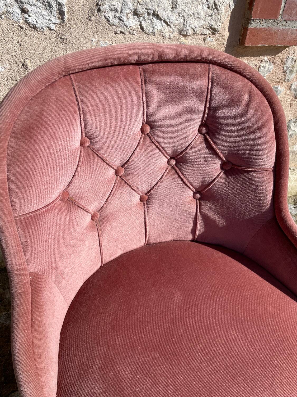 Pink velvet armchair