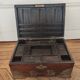Old Indian wooden wedding chest decorated with chiseled brass plaque. India late 19th/early 20th