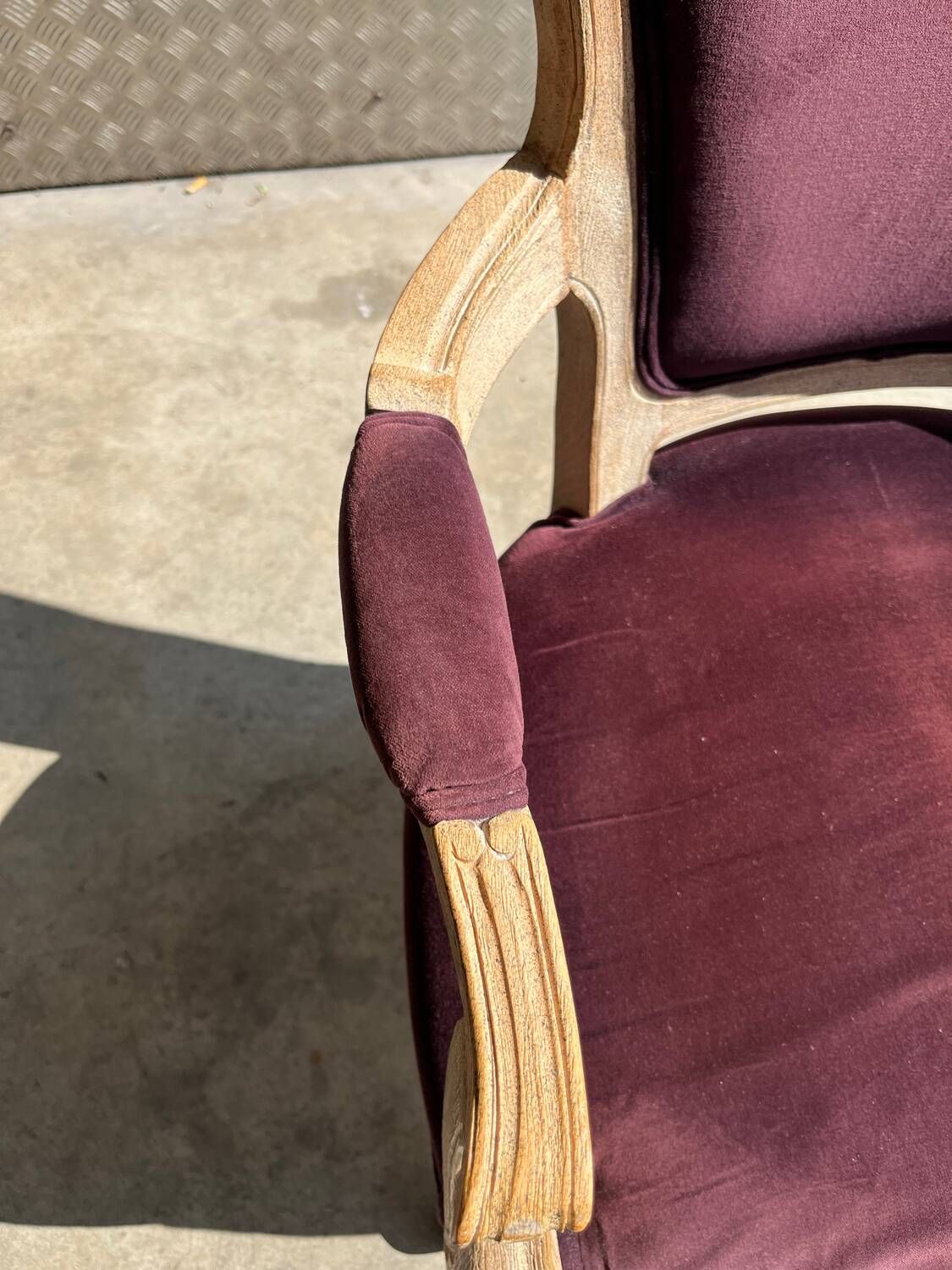 Louis XV style cabriolet armchair in burgundy velvet and carved wood