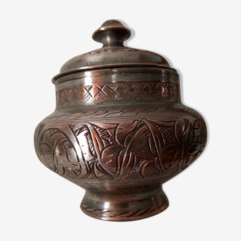 Old oriental covered pot. Islamic calligraphy