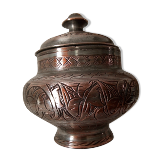 Old oriental covered pot. Islamic calligraphy