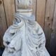 Stand, corbel, wall console in stucco with leaf ornament
