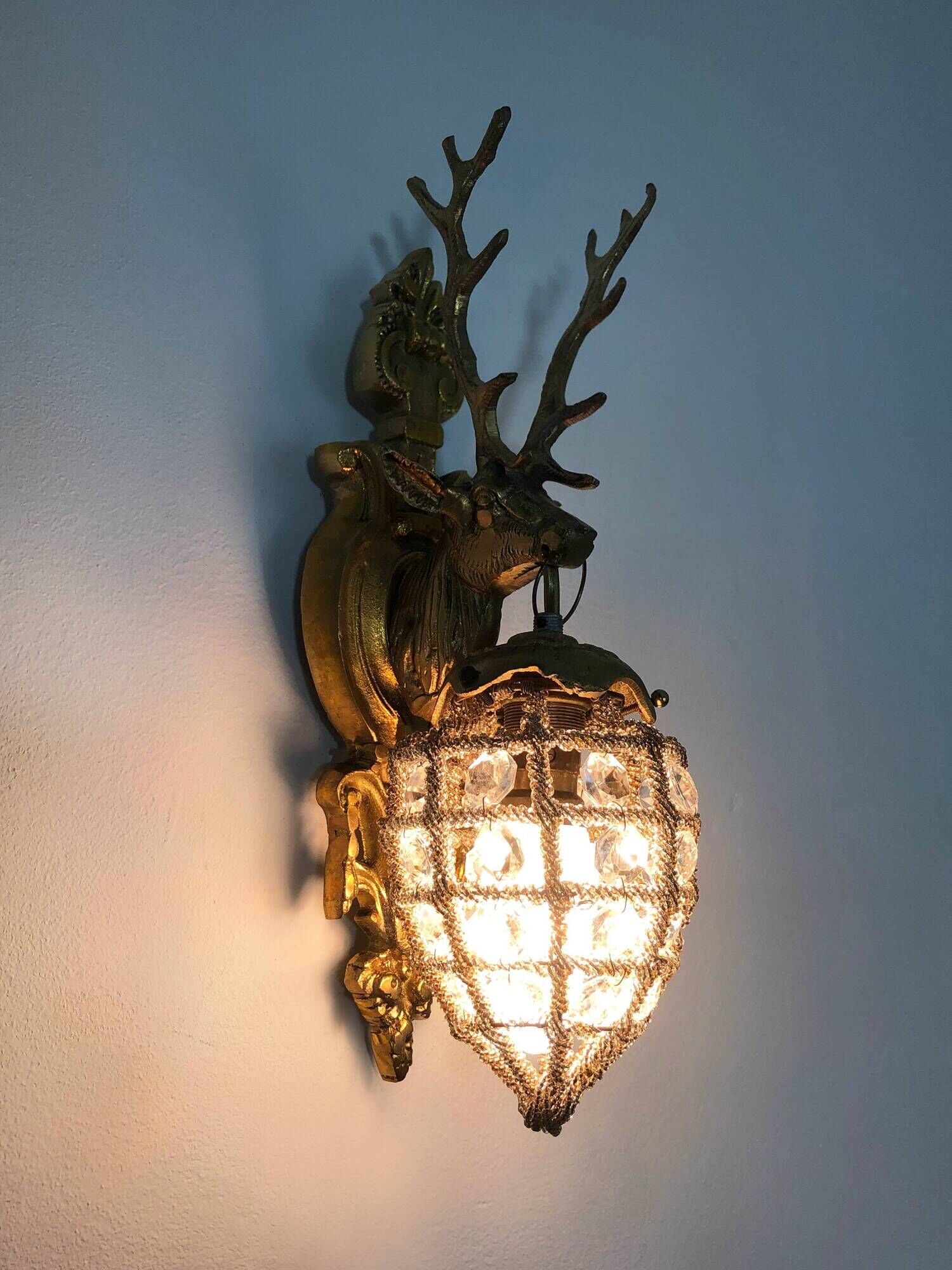Pair of vintage wall lamps with pearl deer head and glass grapevines