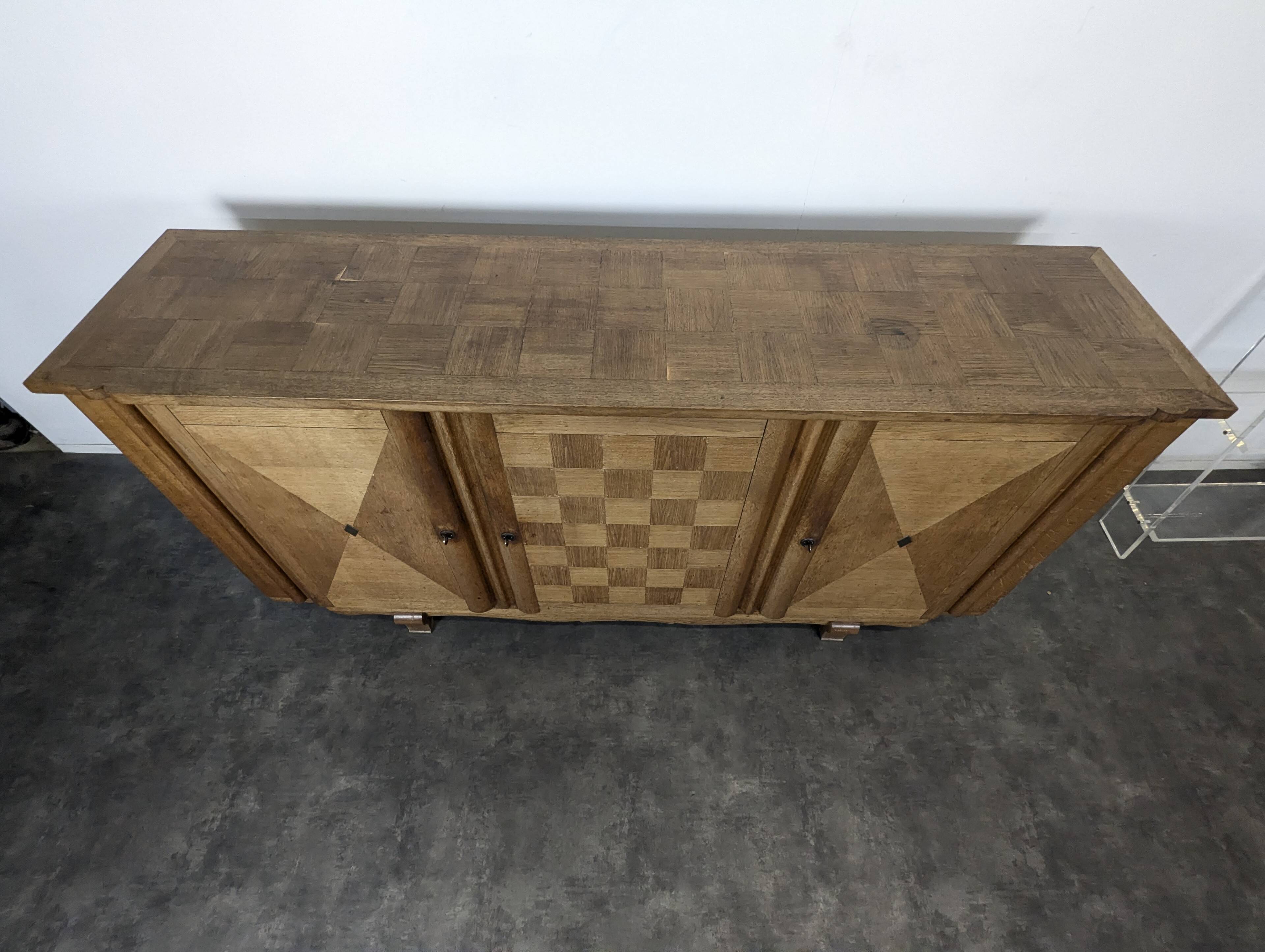 Art Deco oak enfilade with checkerboard marquetry, three doors, 1940s.