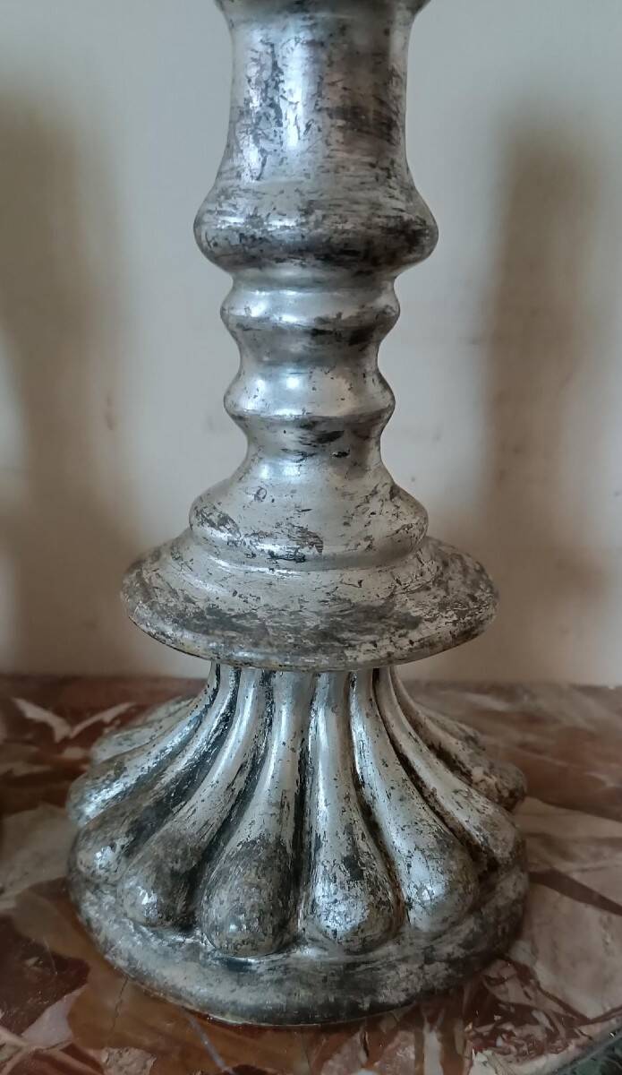 Rare pair of antique silvered terracotta candlesticks from the 17th century.