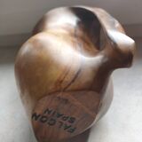 Olive wood pitcher.