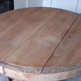 Oval wooden table with extensions