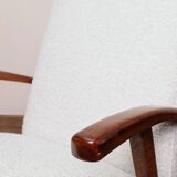 Vintage armchair in pearl white bouclé with walnut wood, 1960.