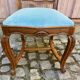 Vintage Louis XV chair made of carved solid wood with blue velvet fabric.
