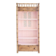 Library, old wooden cabinet imitating bamboo painted in pink