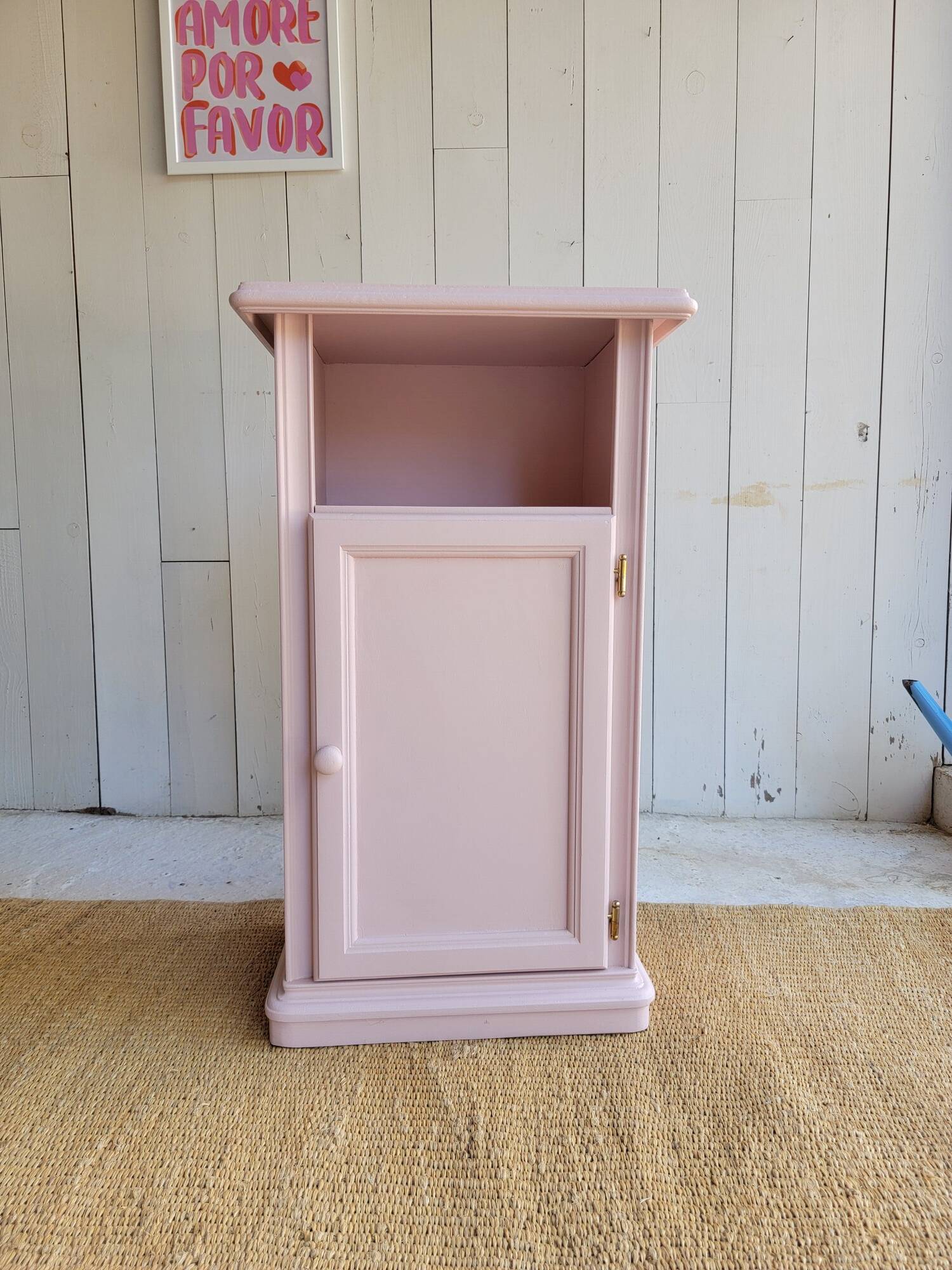 Antique bedside table revamped in pink.