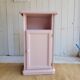 Antique bedside table revamped in pink.