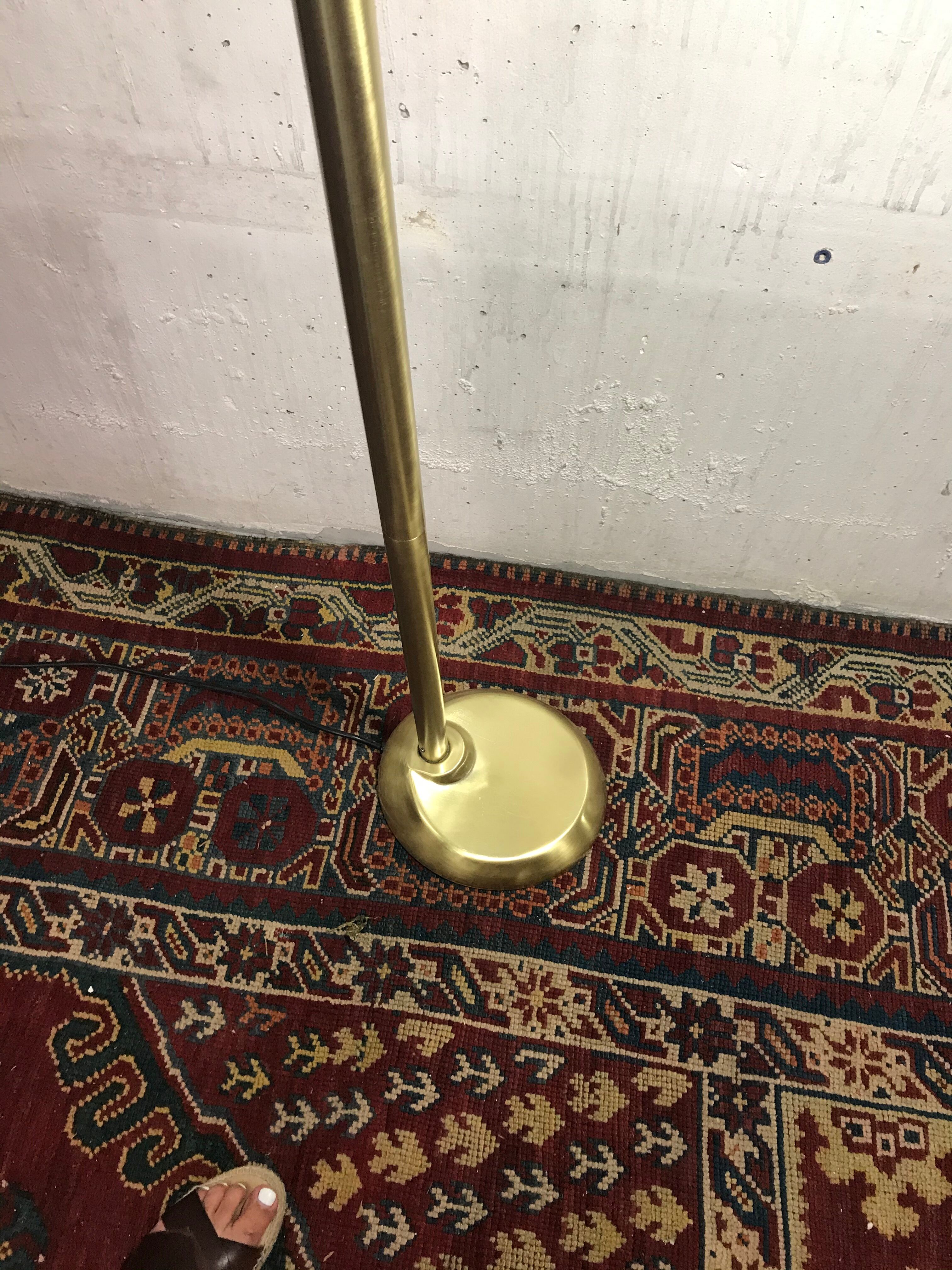 Golden articulated lamppost