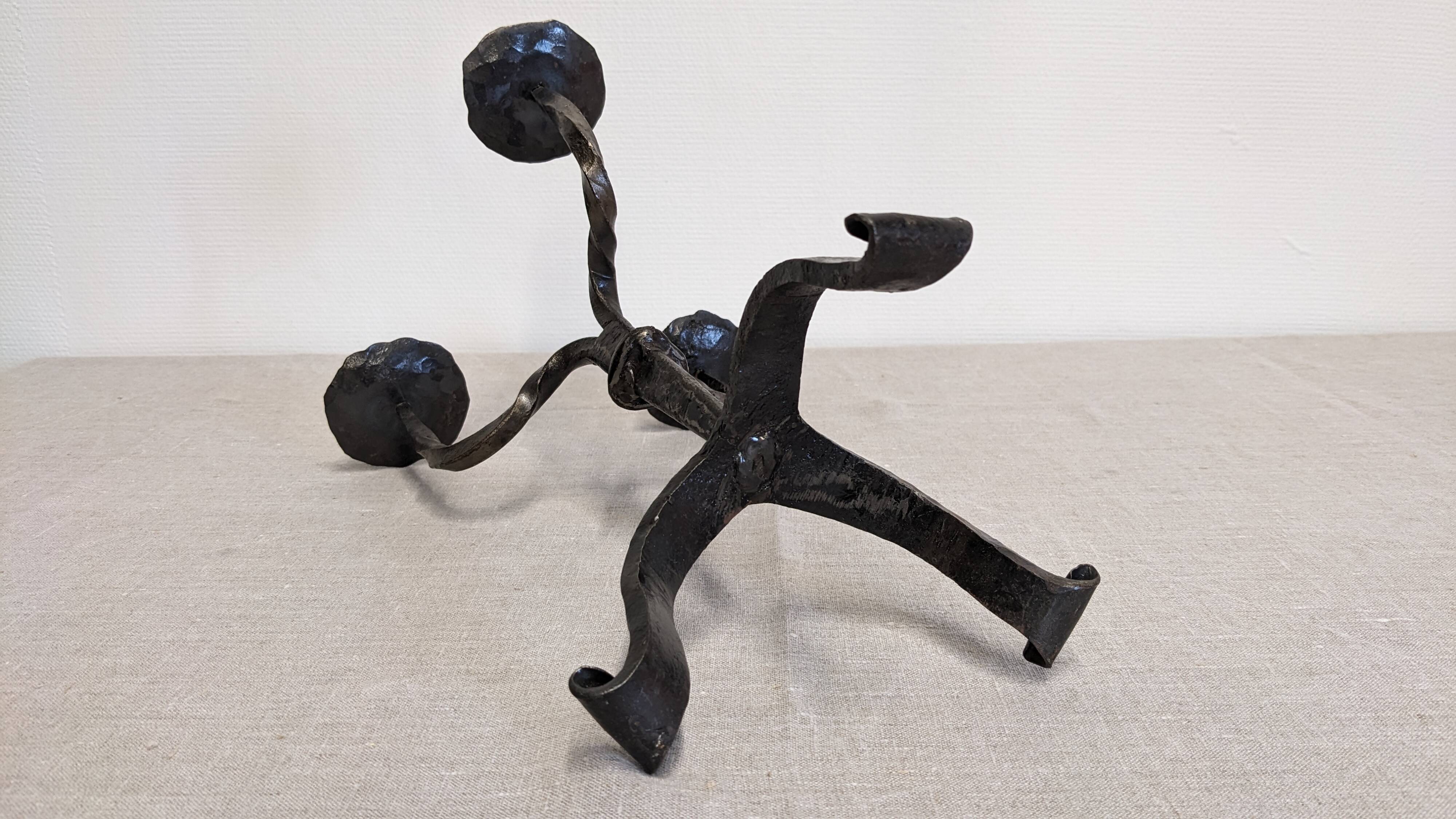 Brutalist candelabrum with 3 lights in wrought iron, France circa 1950.
