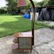 Art Deco brown walnut cocktail bar cabinet with integrated lamp and mirrored display 1950s
