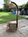 Art Deco brown walnut cocktail bar cabinet with integrated lamp and mirrored display 1950s