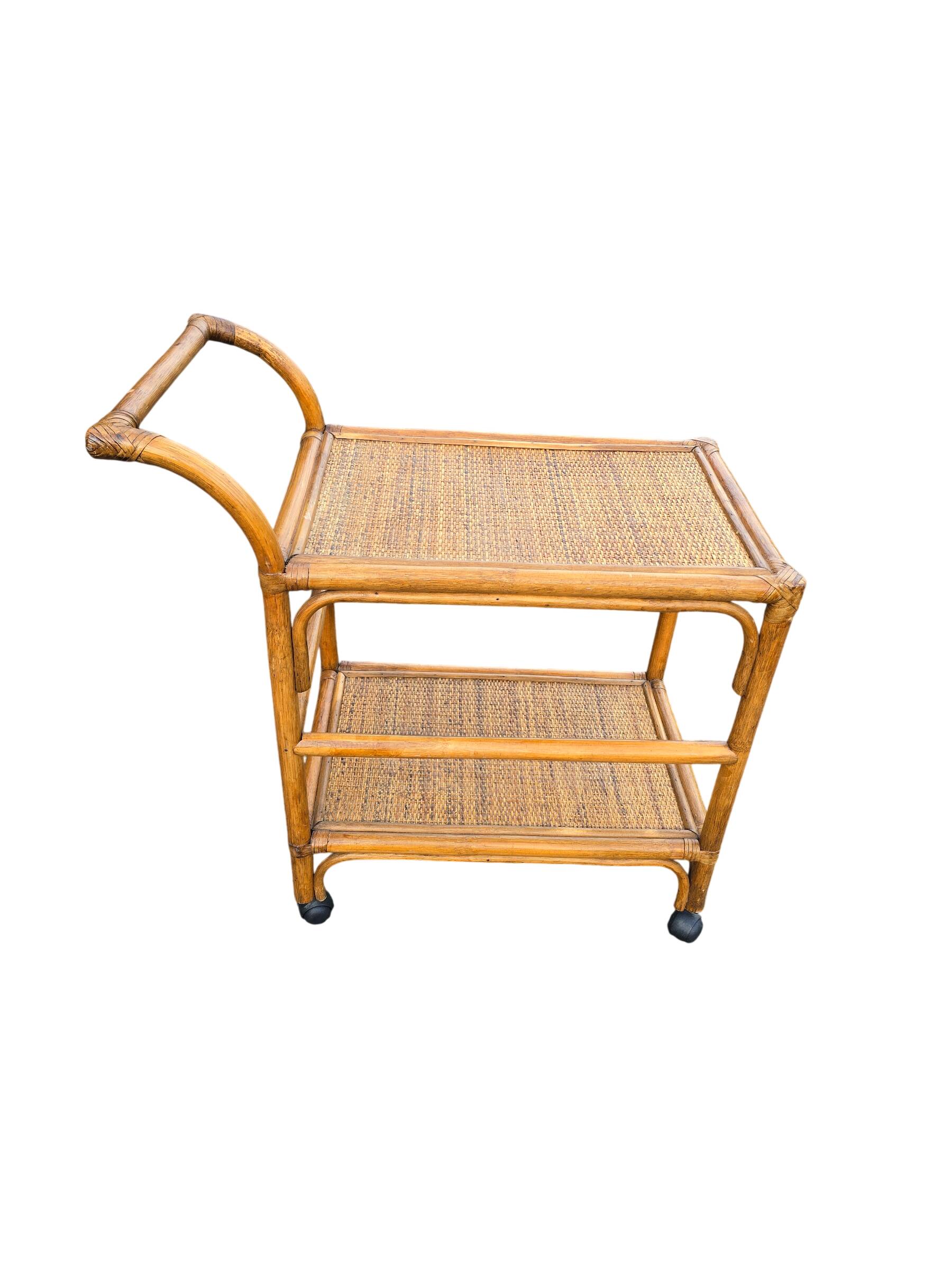 Vintage rolling dessert trolley in rattan and cane from the 60s/70s.