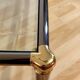 Hollywood regency gold metal & smoked silver coffee table, cut glass