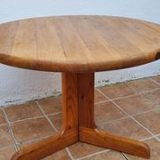Scandinavian coffee table in solid pine with tripod legs in Swedish chalet style.