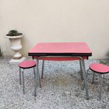 Table with two stools in red formica