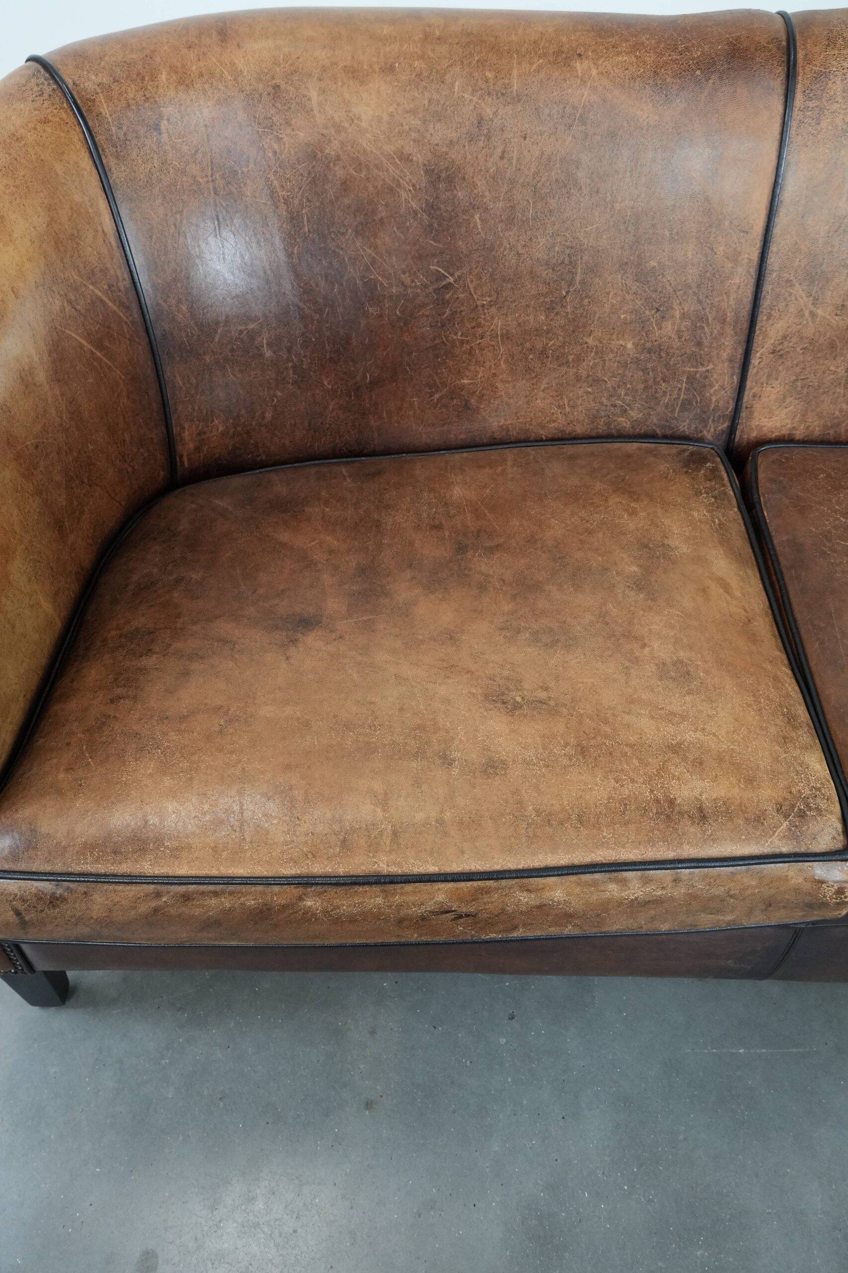 Comfortable vintage sheepskin 2.5-seater club sofa