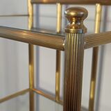 Bedside table in brass and glass.