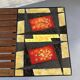 Table basse mid-century, teck, acier et pierre de lave