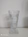 Large carved glass vase on foot